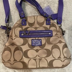Coach crossbody purse with purple accents/straps